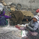 Women extracting copper from electrical wires, in a highly polluting process.